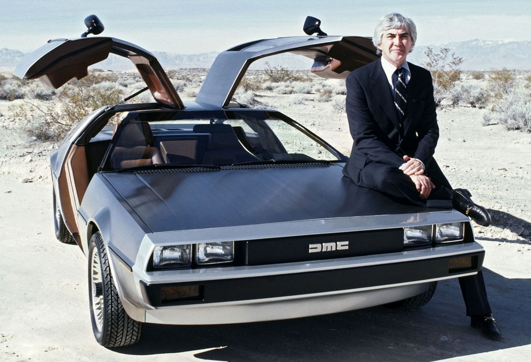  John DeLorean and one of his serial "stainless" DMC 12